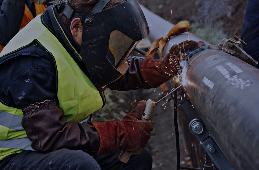 Pipe being welded on site